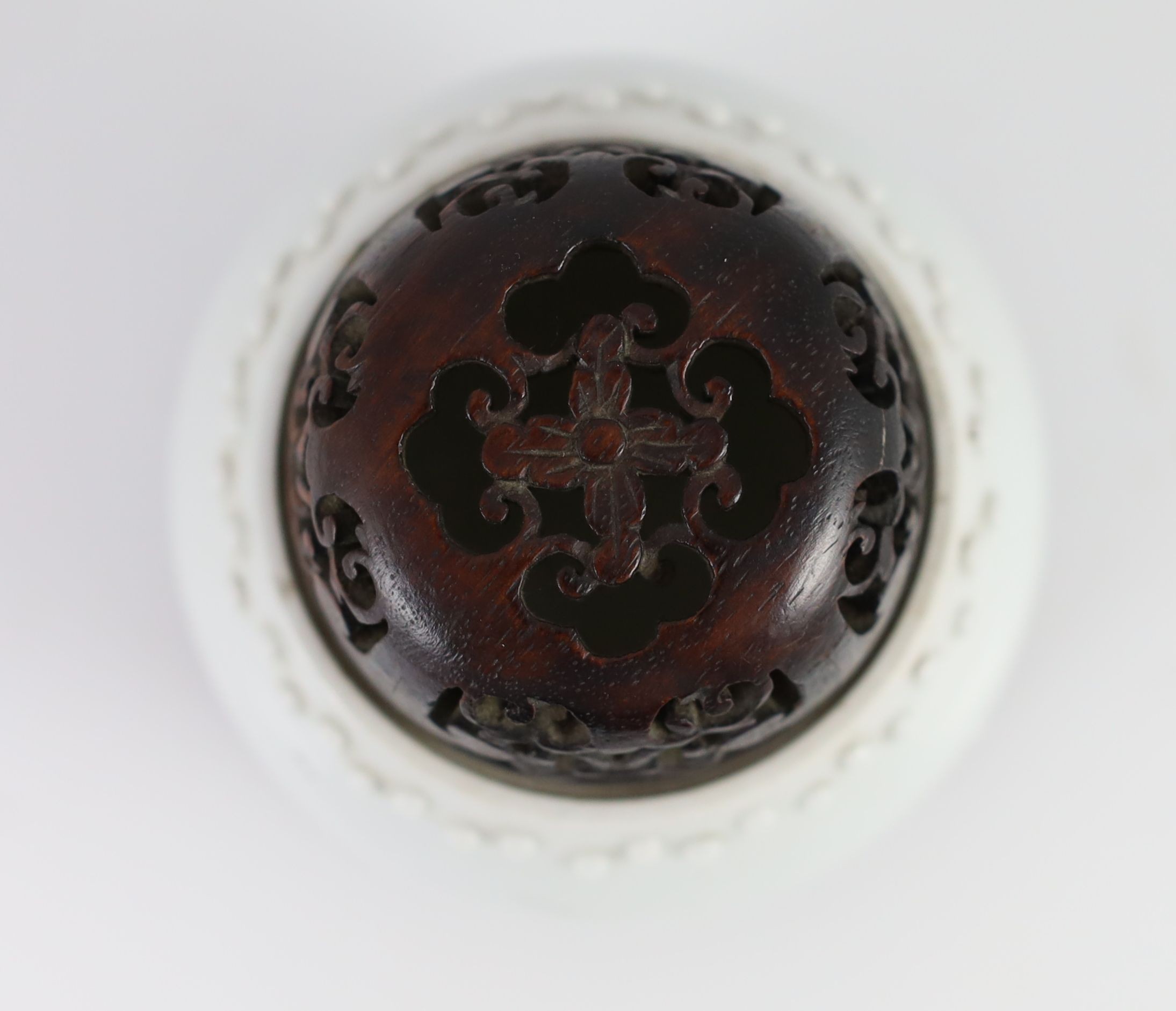 A Chinese blanc-de-chine jar, Dehua kilns, Kangxi period,of barrel seat form,8cm high excluding wood - Image 2 of 3