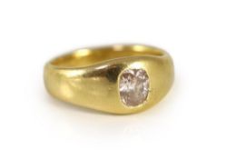 A Victorian 18ct gold and gypsy set oval cushion cut diamond set ring,the stone measuring