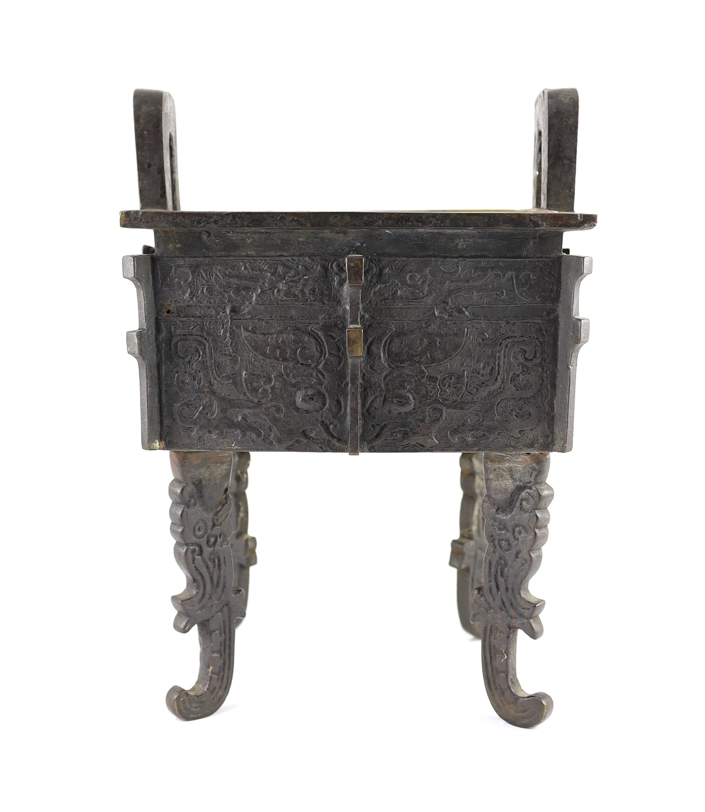 A Chinese archaistic bronze rectangular censer, fangding, 17th/18th centurydecorated in low relief - Image 2 of 6