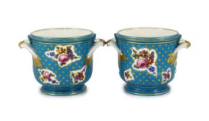 A pair of Sevres bottle coolers (seaux a bouteille) date code for 1764,painted with bouquets of