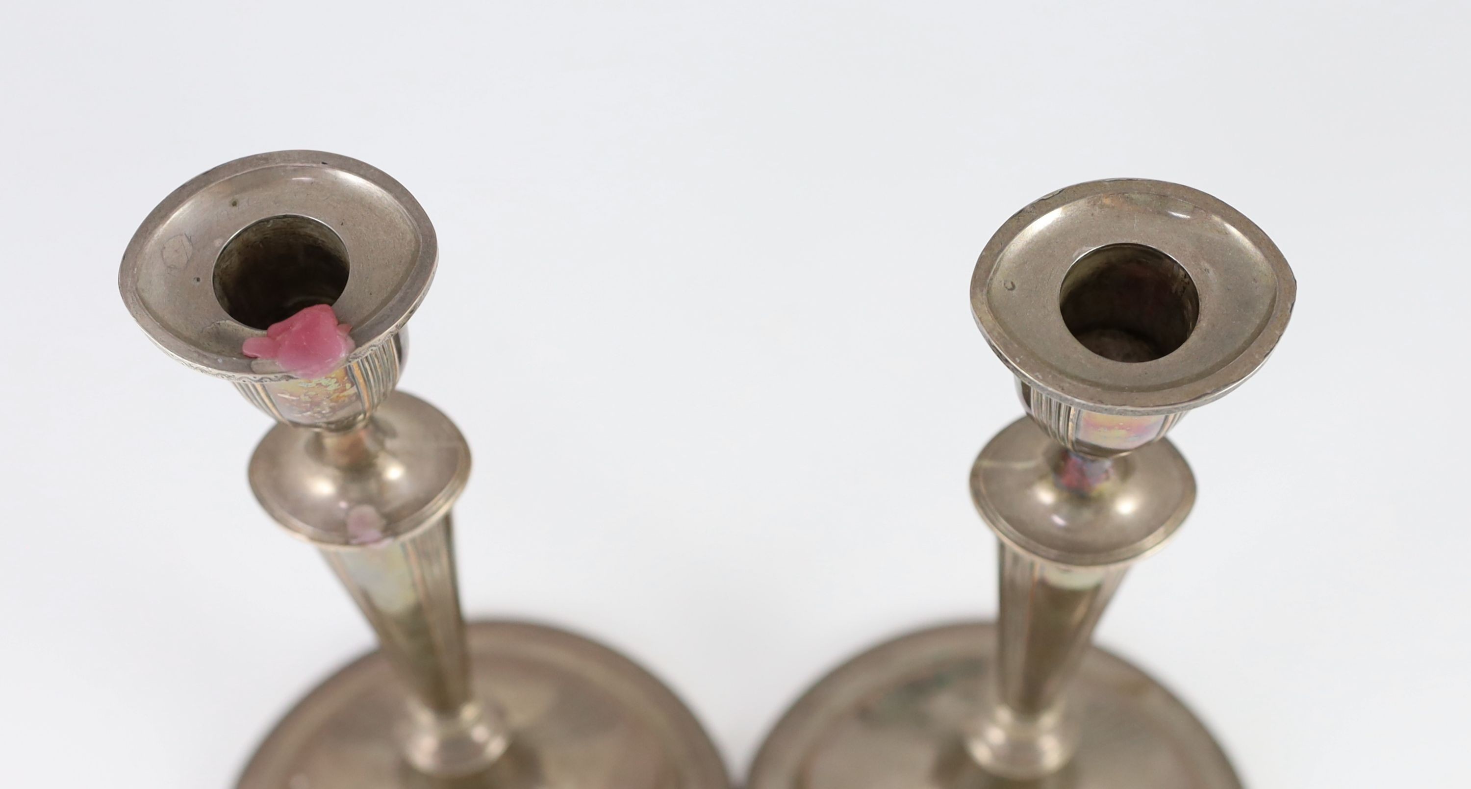 A pair of Sheffield plate candlesticks and nozzles,of neo-classical elliptical form, the stems - Image 2 of 4