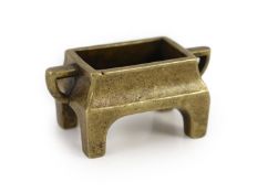 A Chinese miniature bronze censer, fangding, 18th/19th century,applied with a pair of handles, the