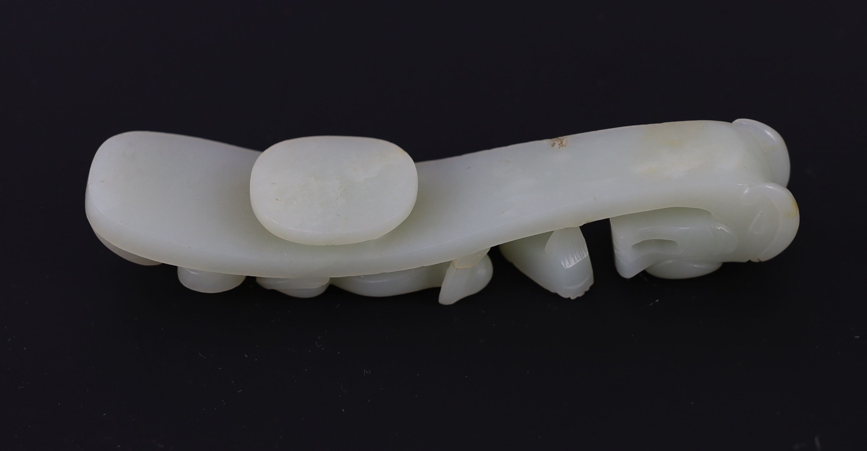 A Chinese pale celadon jade ‘dragon’ belt hook, 18th/19th century,the stone of good even tone with - Image 3 of 3