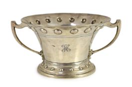 A George V silver two handled vase, by Wakely & Wheeler,with engraved initial and bead decorated