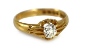 A late Victorian 18ct gold and claw set oval cushion cut diamond set ring,the stone measuring, 6.