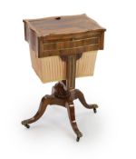 An early Victorian brass inset rosewood work table,with hinged top, side drawer and silks box, on