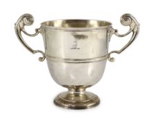 A George II Irish silver two handled presentation trophy cup, maker's mark rubbed,with engraved