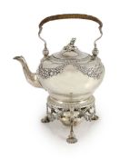 A George II silver spirit kettle on stand with burner, by Paul Crispin,of pear form with rattan