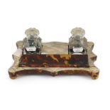 A Victorian tortoiseshell and mother of pearl inkstand,with a pair of glass inkwells and covers,