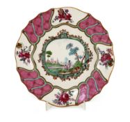 A Tournai porcelain plate, c.1760,painted to a central cartouche with two figures in a river