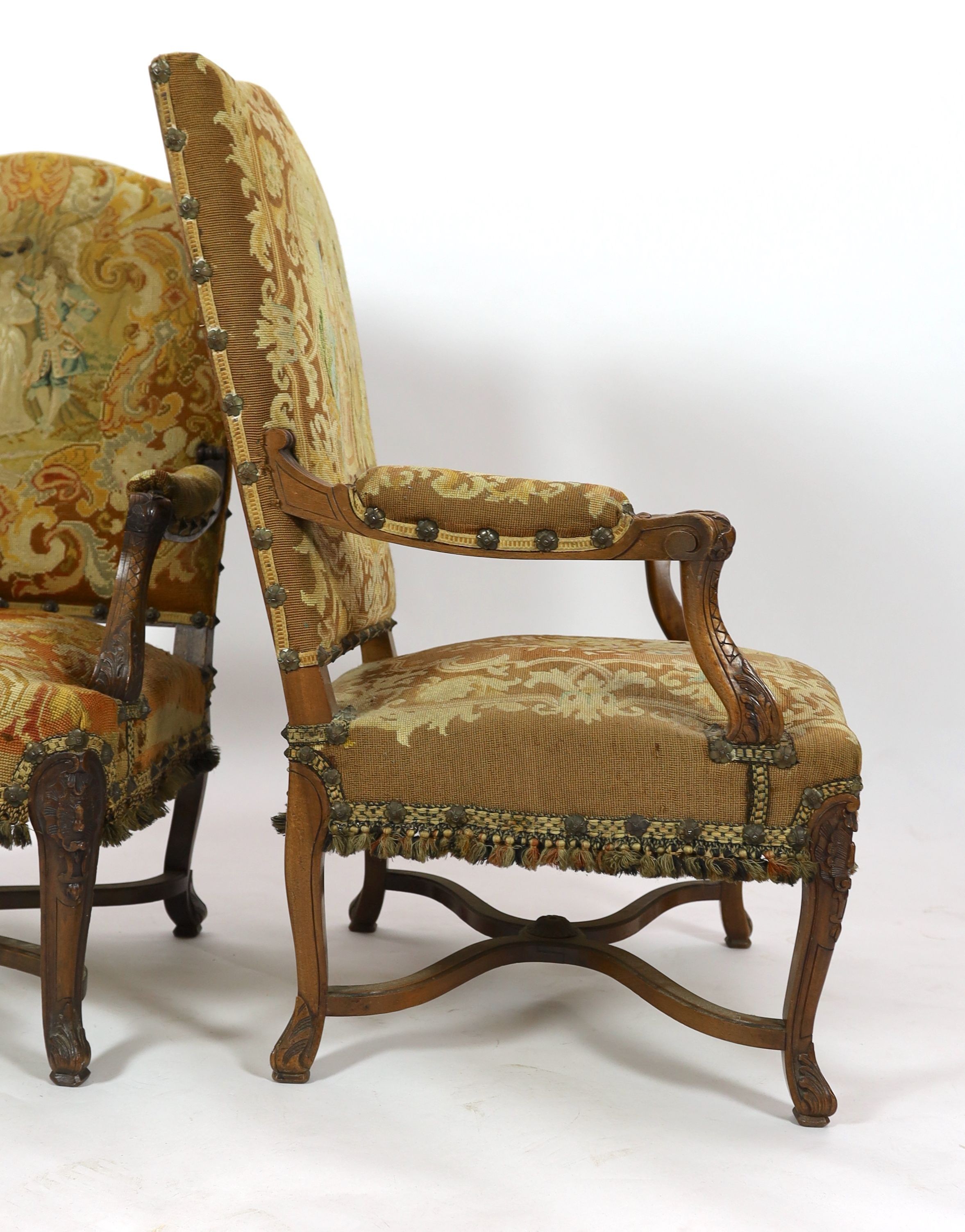 A pair of 19th century French walnut fauteuilswith scroll frames and part needlework upholsteryW. - Image 4 of 5