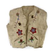 A Native American Plains Indian glass beadwork hide waistcoat, probably IroquoisSome staining and