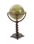 A Thomas Malby & Son 18 inch terrestrial globe,with associated turned walnut underframe,diameter