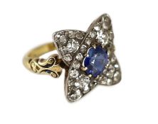 A mid 20th century 18ct gold, sapphire and diamond star shaped cluster dress ring,with carved