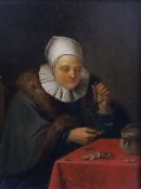 18th century Flemish School Woman seated at a table counting moneyoil on wooden panel18.5 x