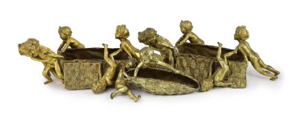 Raoul Francois Larche (French, 1860 - 1912). A set of three ormolu groups of children pushing and