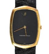 A gentleman's 18ct gold Audemars Piguet manual wind dress wrist watch,with black dial, on an