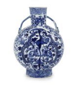 A Chinese blue and white ‘dragon’ moon flask, late 18th century,each side painted with confronting