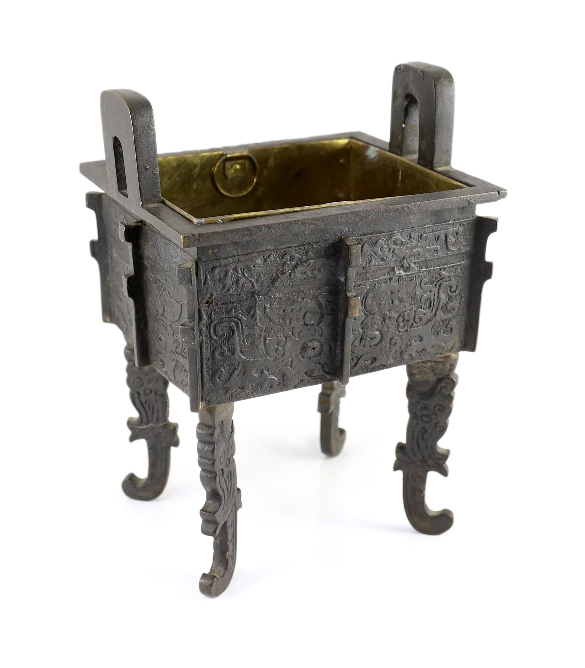 A Chinese archaistic bronze rectangular censer, fangding, 17th/18th centurydecorated in low relief