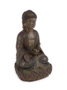 A Chinese Ming cast iron figure of Buddha Shakyamuni, 15th/16th century,seated on a lotus throne,