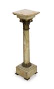 An Edwardian ormolu mounted onyx pedestal,with square top, corinthian capital and block base,W,