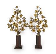 A pair of 19th century French ormolu five light candelabra modelled as lilies,on rouge marble