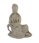 A Chinese blanc-de-chine seated figure of Guanyin, Dehua kilns, 19th/20th century,holding a ruyi