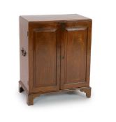 A George III mahogany secretary's cabinet,of plain rectangular form with two fielded panelled doors,