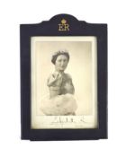 A Dorothy Wilding black and white photograph of the Queen Mother,signed and dated in the margin