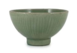 A Chinese Longquan celadon ‘Gu Shi’ bowl, 15th century,the exterior incised with lines in