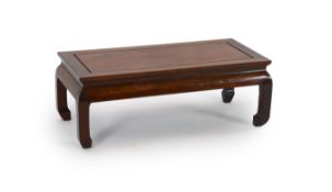 A small Chinese huanghuali Kang table, late Qing dynasty,the rectangular panelled and framed top