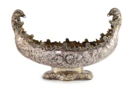 A 20th century Continental embossed 900 standard silver boat shaped centrepiece bowl,decorated