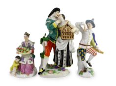 A Meissen group of Scaramouche and Columbine, a similar group of a Chinese mother and child and a