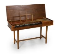 An Arnold Dolmetsch of Haslemere clavichord,with boxwood and ebony strung satinwood banding, and