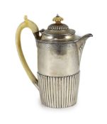 A Victorian demi-fluted silver hot water pot, by Frederick Brasted,with ivory handle and finial,