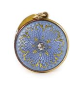 An Edwardian engine turned gold, blue guilloche enamel with gilded scrolls and diamond set