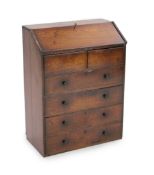 An early 19th century Anglo Indian rosewood ship's bureau,the fall with original lock and reeded