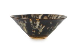 A Chinese Jizhou tortoiseshell glazed tea bowl, Song dynasty,12.3cmThere’s a fine crackle to the