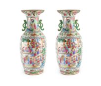 A pair of large Chinese famille rose twin handled vases, mid 19th century,each painted with