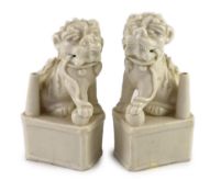 A pair of Chinese blanc-de-chine Buddhist lion joss stick holders, Dehua kilns, Kangxi period,each