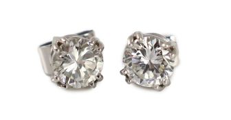 A pair of white gold and solitaire diamond set ear studs,each stone measuring approximately 6.3mm in