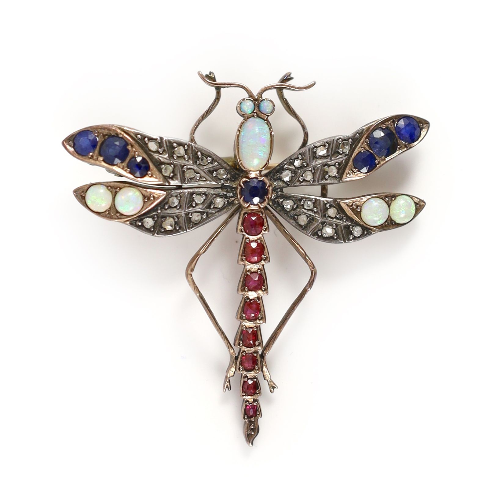 A Victorian gold and silver, opal, sapphire, ruby and diamond set dragonfly brooch,49mm, gross