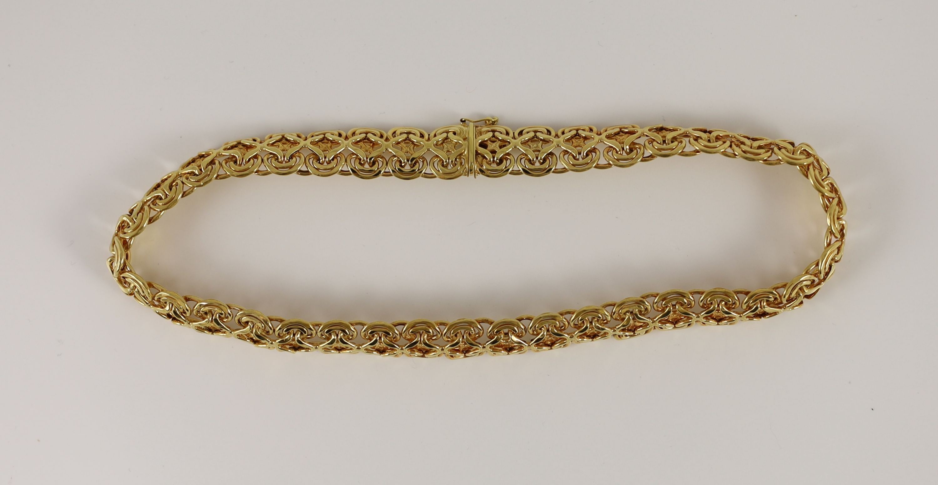 A modern 14k gold pierced scroll link necklace,40cm, 35.9 grams.Overall good condition.PLEASE NOTE:- - Image 2 of 4