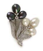 A 20th century platinum, baroque cultured and Tahitian pearl, round and baguette cut diamond cluster