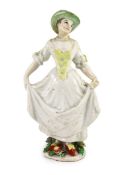 A rare Chelsea figure of a dancing girl, c.1752-55, probably modelled by Joseph Willems,standing and