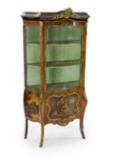 A French gilt metal mounted kingwood serpentine vitrine,with Vernis Martin style decoration, scallop