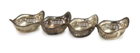A set of four Edward VII silver pierced oval bon-bon dishes,maker L & S, Birmingham 1906/7, formerly