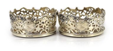 A pair of early Victorian pierced silver mounted wine coasters, by Joseph & Joseph Angell,with
