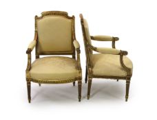 A good pair of 19th century French gilt wood elbow chairs101 cm high, 62cm wide.Several old