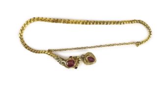 An early 19th century two colour gold and foil backed pink gem set serpent head and snake link